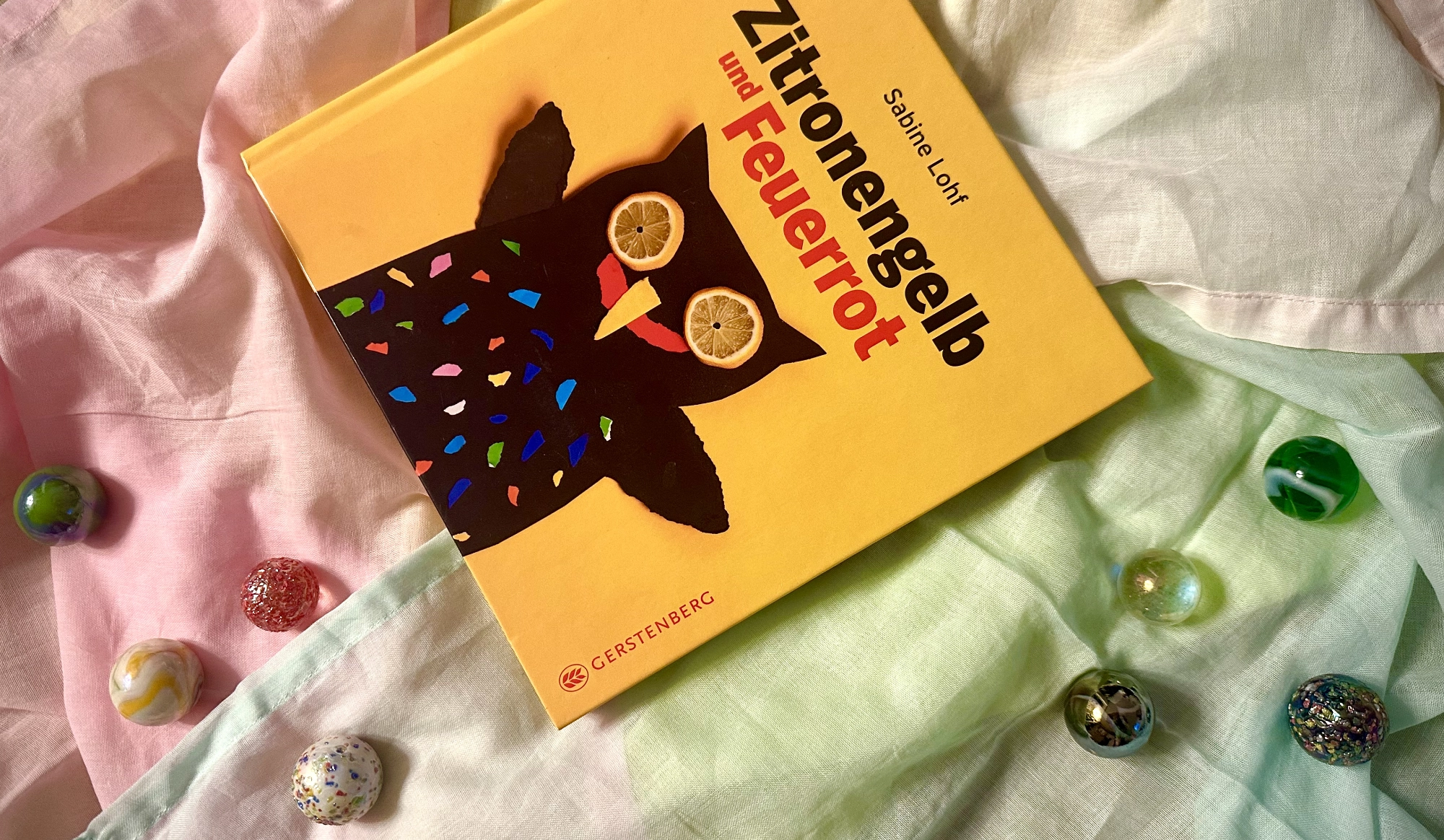 Buchcover Zitronengelb und Feuerrot von Sabine Lohf